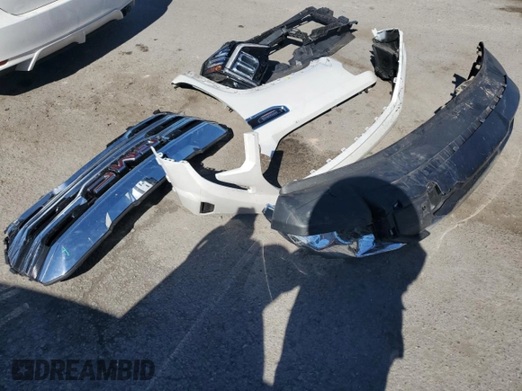 2023 GMC Sierra 1500 SLT z VIN 3GTUUDE83PG267733, wystawiony jako Copart lot #61530004 z przebiegiem 21 446 mil mil oraz Szkoda całkowita • Salvage title. Historia ofert i sprzedaży dostępna na DreamBid. Obrazek 12.