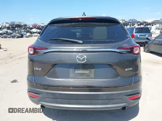 2019 Mazda CX-9 Touring with VIN JM3TCACY9K0304899, listed as a IAAI auction lot 42167180 with 57,043 mi miles and . Bid and sale history available at DreamBid. Image 16.