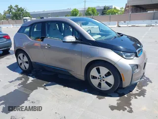 2014 BMW i3 z VIN WBY1Z4C56EV276183, wystawiony jako IAAI lot #42345866 z przebiegiem 102 934 mil mil oraz . Historia ofert i sprzedaży dostępna na DreamBid. Obrazek 1.