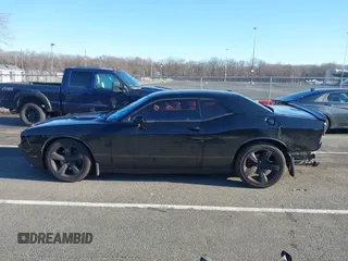 2013 Dodge Challenger R/T with VIN 2C3CDYBT6DH614418, listed as a IAAI auction lot 41583274 with 63,409 mi miles. Bid and sale history available at carsss.com. Image 14.