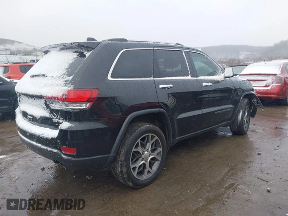 2021 Jeep Grand Cherokee 80th Anniversary with VIN 1C4RJFBG4MC510082, listed as a IAAI auction lot 41072125 with 55,610 mi miles and . Bid and sale history available at DreamBid. Image 4.