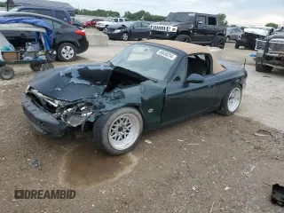 1999 Mazda MX-5 Miata z VIN JM1NB3531X0135891, wystawiony jako Copart lot #69638254 z przebiegiem 240 882 mil mil oraz Szkoda całkowita • Salvage title. Historia ofert i sprzedaży dostępna na DreamBid. Obrazek 1.