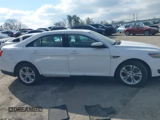 2019 Ford Taurus SEL with VIN 1FAHP2E80KG115318, listed as a IAAI auction lot 41627736 with 111,911 mi miles and . Bid and sale history available at DreamBid. Image 13.