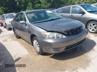2006 Toyota Camry STD z VIN 4T1BE32K96U718749, wystawiony jako IAAI lot #42325200 z przebiegiem 283 957 mil mil oraz . Historia ofert i sprzedaży dostępna na DreamBid. Obrazek 1.