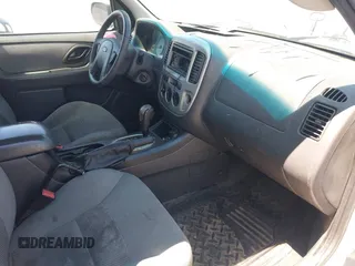 2006 Ford Escape XLT с VIN 1FMYU03196KC34657, выставлен на аукционе IAAI как лот 42207202 с пробегом 235 799 миль миль и . История ставок и продаж доступна на DreamBid. Изображение 5.