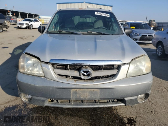 2002 Mazda Tribute LX with VIN 4F2YU09152KM50320, listed as a Copart auction lot 88131405 with 238,013 mi miles and Salvage Title. Bid and sale history available at carsss.com. Image 5.