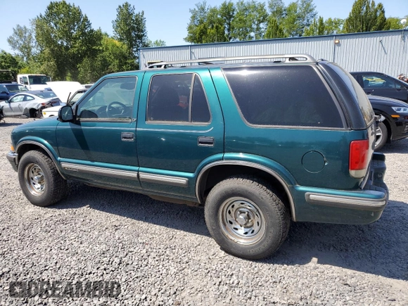 1998 Chevrolet Blazer LS with VIN 1GNDT13W5W2184533, listed as a Copart auction lot 59441555 with 124,339 mi miles and Clean title. Bid and sale history available at DreamBid. Image 2.