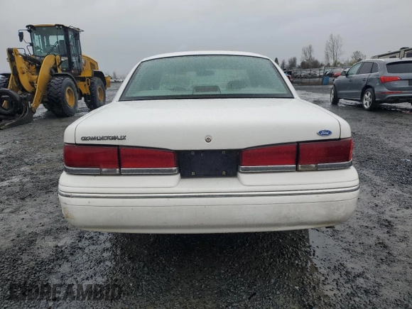 1995 Ford Crown Victoria LX с VIN 2FALP74W1SX200511, выставлен на аукционе Copart как лот 48807055 с пробегом 62 133 миль миль и Списание • Salvage title. История ставок и продаж доступна на DreamBid. Изображение 6.