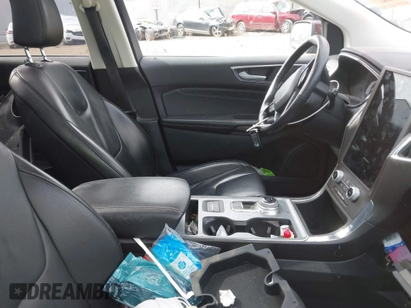 2021 Ford Edge Titanium with VIN 2FMPK4K99MBA41965, listed as a IAAI auction lot 42114607 with 87,848 mi miles and . Bid and sale history available at DreamBid. Image 5.