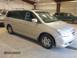 2006 Honda Odyssey EX-L with VIN 5FNRL387X6B449343, listed as a IAAI auction lot 42162759 with 242,590 mi miles. Bid and sale history available at carsss.com. Image 1.