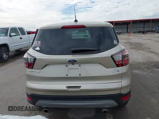 2017 Ford Escape SE with VIN 1FMCU9GD1HUB28732, listed as a IAAI auction lot 41546177 with 126,698 mi miles and . Bid and sale history available at DreamBid. Image 16.