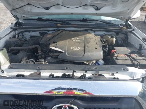 2015 Toyota Tacoma with VIN 3TMLU4EN5FM188601, listed as a IAAI auction lot 41883555 with 143,904 mi miles and . Bid and sale history available at DreamBid. Image 10.