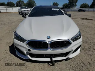 2023 BMW 8 Series M850i with VIN WBAGV8C0XPCK39846, listed as a Copart auction lot 61173594 with 0 mi miles and Salvage Title. Bid and sale history available at carsss.com. Image 5.