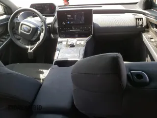 2023 Subaru Solterra Premium с VIN JTMABABA5PA027256, выставлен на аукционе Copart как лот 55825145 с пробегом 16 642 миль миль и На запчасти • Non repairable. История ставок и продаж доступна на DreamBid. Изображение 8.