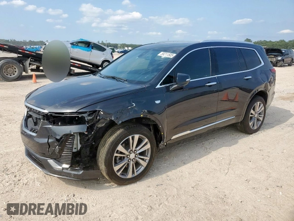 2022 Cadillac XT6 Premium Luxury z VIN 1GYKPCRS1NZ104567, wystawiony jako Copart lot #58211505 z przebiegiem 54 541 mil mil oraz Tytuł czysty. Historia ofert i sprzedaży dostępna na DreamBid. Obrazek 1.