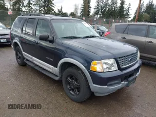 2002 Ford Explorer XLT z VIN 1FMZU73E42ZB66396, wystawiony jako IAAI lot #41919878 z przebiegiem 169 742 mil mil oraz . Historia ofert i sprzedaży dostępna na DreamBid. Obrazek 1.