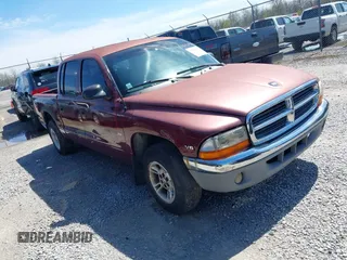 2000 Dodge Dakota Sport with VIN 1B7GL2AX7YS677544, listed as a IAAI auction lot 41965480 with 236,552 mi miles. Bid and sale history available at carsss.com. Image 1.