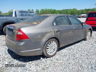 2010 Ford Fusion Hybrid z VIN 3FADP0L32AR148435, wystawiony jako IAAI lot #41987937 z przebiegiem 224 290 mil mil oraz . Historia ofert i sprzedaży dostępna na DreamBid. Obrazek 4.