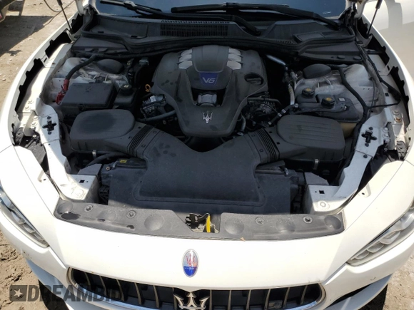 2014 Maserati Ghibli S Q4 z VIN ZAM57RTA1E1126438, wystawiony jako Copart lot #58388215 z przebiegiem 95 167 mil mil oraz Czysty tytuł • Clean title. Historia ofert i sprzedaży dostępna na DreamBid. Obrazek 11.