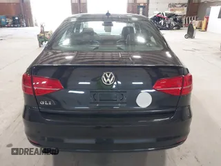 2015 Volkswagen Jetta Sedan 2.0T GLI SE with VIN 3VW5T7AJ0FM275867, listed as a IAAI auction lot 42133491 with 98,718 mi miles. Bid and sale history available at carsss.com. Image 17.