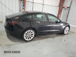 2022 Tesla Model 3 z VIN 5YJ3E1EA1NF286584, wystawiony jako Copart lot #48597405 z przebiegiem 83 340 mil mil oraz Czysty tytuł • Clean title. Historia ofert i sprzedaży dostępna na DreamBid. Obrazek 3.