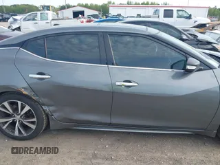 2016 Nissan Maxima SL with VIN 1N4AA6AP8GC430051, listed as a IAAI auction lot 41983059 with 166,786 mi miles and . Bid and sale history available at DreamBid. Image 13.