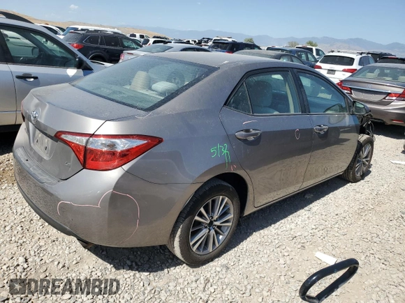 2014 Toyota Corolla L with VIN 5YFBURHE0EP014897, listed as a Copart auction lot 60668845 with 266,691 mi miles and Salvage title. Bid and sale history available at DreamBid. Image 3.