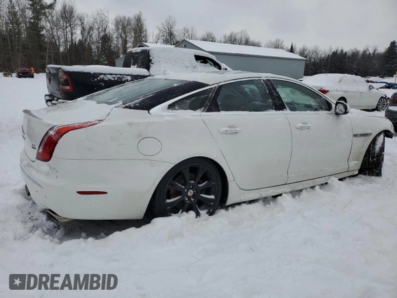 2015 Jaguar XJ Premium Luxury with VIN SAJXJ1CD0F8V88669, listed as a Copart auction lot 86063734 with 155,712 mi miles and Clean Title. Bid and sale history available at DreamBid. Image 3.