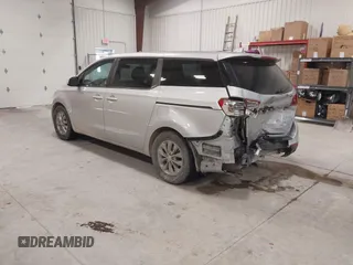 2021 Kia Sedona LX with VIN KNDMB5C18M6673537, listed as a IAAI auction lot 41248120 with 50,255 mi miles. Bid and sale history available at carsss.com. Image 3.