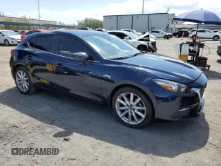 2017 Mazda 3 Touring with VIN 3MZBN1L71HM149340, listed as a Copart auction lot 60093215 with 71,060 mi miles and Salvage title. Bid and sale history available at DreamBid. Image 4.