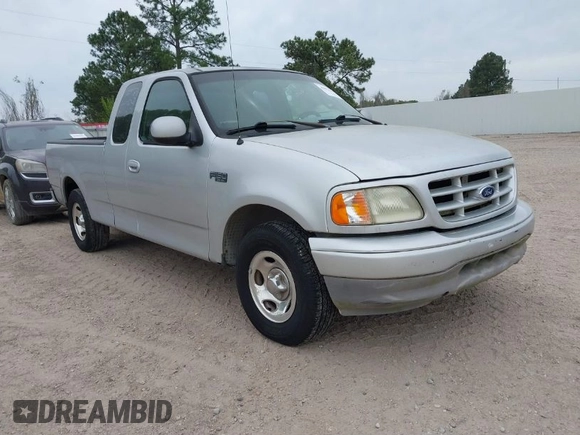 2002 Ford F-150 XL with VIN 1FTRX17282NA84011, listed as a IAAI auction lot 41871210 with 1 mi miles. Bid and sale history available at carsss.com. Image 1.