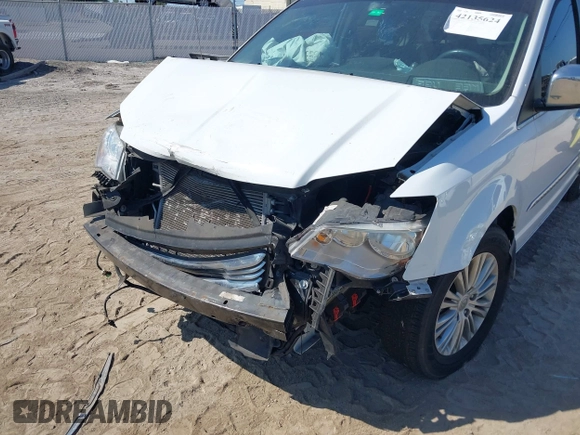 2015 Chrysler Town & Country Touring L with VIN 2C4RC1CG9FR547098, listed as a IAAI auction lot 42135624 with 61,364 mi miles and . Bid and sale history available at DreamBid. Image 6.