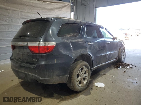 2013 Dodge Durango Crew z VIN 1C4RDJDG1DC675594, wystawiony jako Copart lot #53536775 z przebiegiem 194 243 mil mil oraz Szkoda całkowita • Salvage title. Historia ofert i sprzedaży dostępna na DreamBid. Obrazek 3.