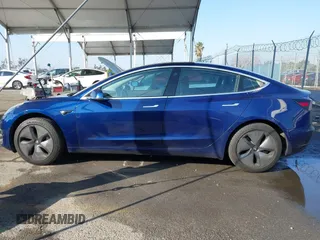 2018 Tesla Model 3 Long Range Battery z VIN 5YJ3E1EA8JF014706, wystawiony jako IAAI lot #41453650 z przebiegiem 68 037 mil mil oraz . Historia ofert i sprzedaży dostępna na DreamBid. Obrazek 14.