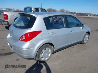2009 Nissan Versa 1.8 S with VIN 3N1BC13E09L502085, listed as a IAAI auction lot 41869799 with 104,078 mi miles. Bid and sale history available at carsss.com. Image 4.
