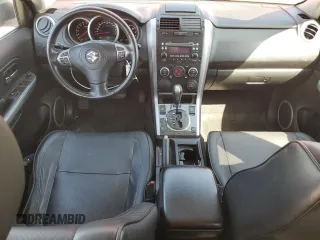 2011 Suzuki Grand Vitara Limited z VIN JS3TE0D72B4100054, wystawiony jako Copart lot #52535705 z przebiegiem 131 468 mil mil oraz Szkoda całkowita • Salvage title. Historia ofert i sprzedaży dostępna na DreamBid. Obrazek 8.
