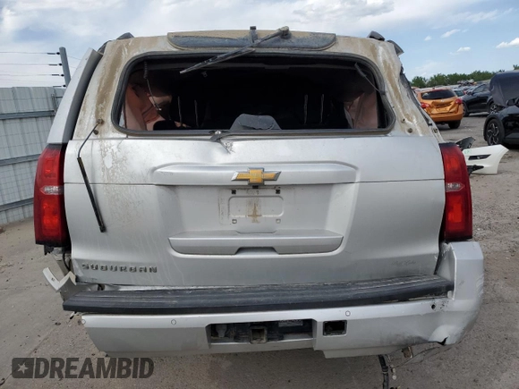 2016 Chevrolet Suburban LT z VIN 1GNSKHKC4GR285212, wystawiony jako Copart lot #58021115 z przebiegiem Nie podano mil oraz Szkoda całkowita • Salvage title. Historia ofert i sprzedaży dostępna na DreamBid. Obrazek 6.