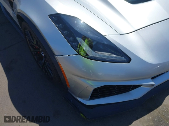 2016 Chevrolet Corvette Z06 2LZ z VIN 1G1YS2D64G5612988, wystawiony jako IAAI lot #42283770 z przebiegiem 22 382 mil mil oraz . Historia ofert i sprzedaży dostępna na DreamBid. Obrazek 6.