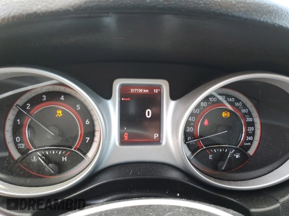 2013 Dodge Journey SE z VIN 3C4PDCAB3DT505527, wystawiony jako Copart lot #56102425 z przebiegiem 217 130 mil mil oraz Szkoda całkowita • Salvage title. Historia ofert i sprzedaży dostępna na DreamBid. Obrazek 9.