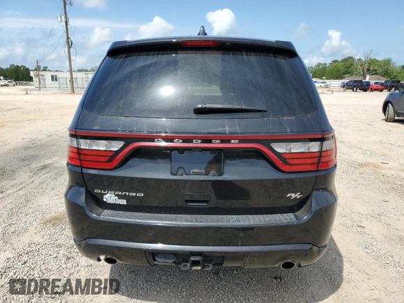 2016 Dodge Durango R/T with VIN 1C4SDHCT9GC415957, listed as a Copart auction lot 53565115 with 144,412 mi miles and Salvage title. Bid and sale history available at DreamBid. Image 6.