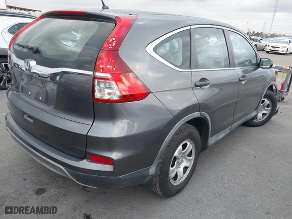 2015 Honda CR-V LX with VIN 3CZRM3H39FG706958, listed as a IAAI auction lot 41549880 with 85,567 mi miles. Bid and sale history available at carsss.com. Image 4.