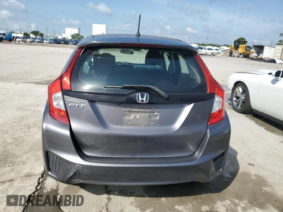 2015 Honda Fit LX с VIN 3HGGK5H59FM757797, выставлен на аукционе Copart как лот 58615175 с пробегом 109 608 миль миль и Списание • Salvage title. История ставок и продаж доступна на DreamBid. Изображение 6.