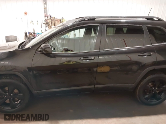 2016 Jeep Cherokee Latitude with VIN 1C4PJMCS2GW218917, listed as a IAAI auction lot 41825426 with 123,789 mi miles and . Bid and sale history available at DreamBid. Image 15.