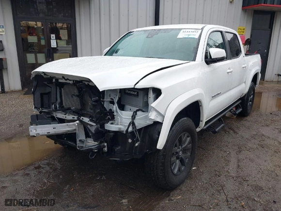 2023 Toyota Tacoma 4WD SR with VIN 3TMCZ5AN6PM633698, listed as a IAAI auction lot 41443892 with 13,214 mi miles. Bid and sale history available at carsss.com. Image 2.