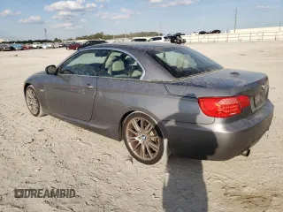 2011 BMW 3 Series 335i with VIN WBADX7C5XBE580244, listed as a Copart auction lot 44993215 with 124,091 mi miles and Salvage Title. Bid and sale history available at carsss.com. Image 2.