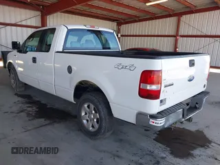 2006 Ford F-150 STX with VIN 1FTRX14WX6NA33218, listed as a IAAI auction lot 41667598 with 318,824 mi miles. Bid and sale history available at carsss.com. Image 3.