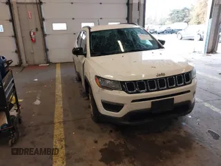 2018 Jeep Compass Sport with VIN 3C4NJCAB6JT124198, listed as a IAAI auction lot 41192196 with 104,557 mi miles. Bid and sale history available at carsss.com. Image 1.