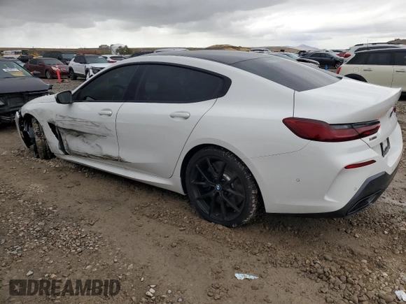 2020 BMW 8 Series M850i with VIN WBAGV8C05LCE00682, listed as a Copart auction lot 77863994 with 22,999 mi miles and Salvage Title. Bid and sale history available at carsss.com. Image 2.