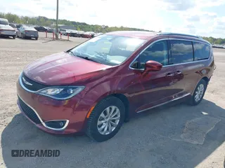 2018 Chrysler Pacifica Touring L with VIN 2C4RC1BG0JR279665, listed as a IAAI auction lot 40336389 with 80,835 mi miles and . Bid and sale history available at DreamBid. Image 17.