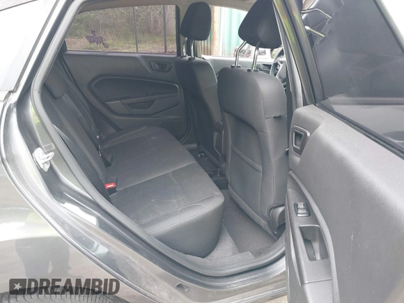 2019 Ford Fiesta SE z VIN 3FADP4BJ7KM155094, wystawiony jako IAAI lot #42186126 z przebiegiem 93 684 mil mil oraz . Historia ofert i sprzedaży dostępna na DreamBid. Obrazek 8.